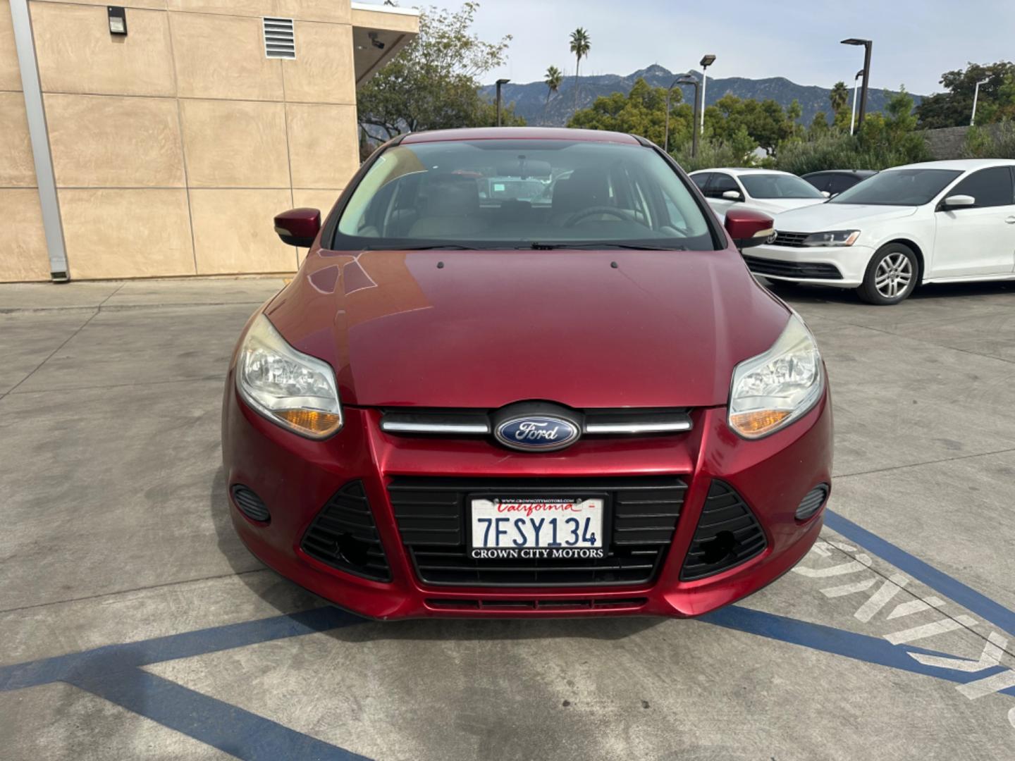 2014 RED /Gray Ford Focus Cloth (1FADP3K24EL) with an 4 Cylinders engine, Automatic transmission, located at 30 S. Berkeley Avenue, Pasadena, CA, 91107, (626) 248-7567, 34.145447, -118.109398 - Good Value! Good MPG! - Photo#1